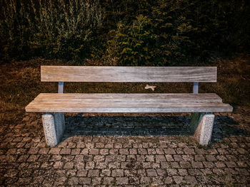 Empty bench in park