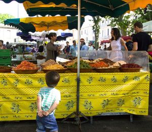 People at market stall