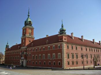 Low angle view of clock tower against sky