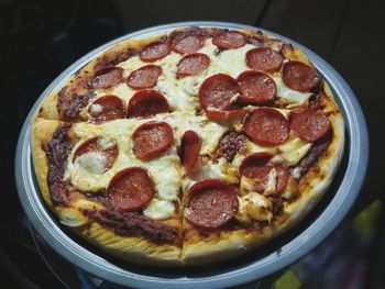 High angle view of pizza in bowl on table