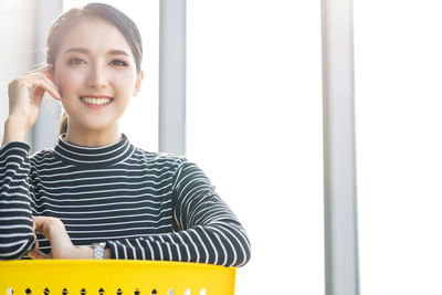 Portrait of a smiling young woman