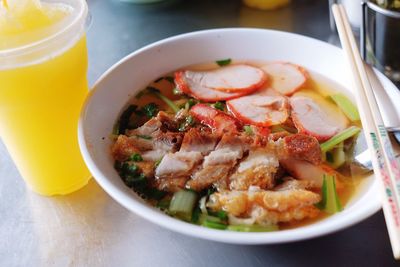 Close-up of noodles in bowl on table