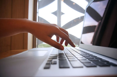 Close-up of business person working in office