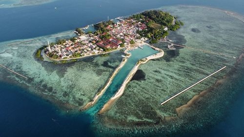 Aerial view of town on island in sea