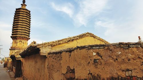 Low angle view of historical building against sky