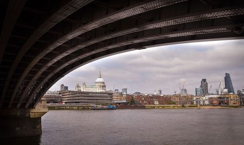 Bridge over river in city