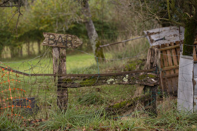 Old wooden fence on field