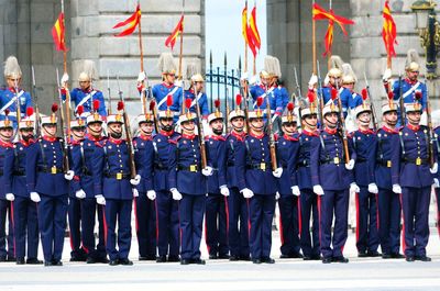 Soldiers standing on road during parade