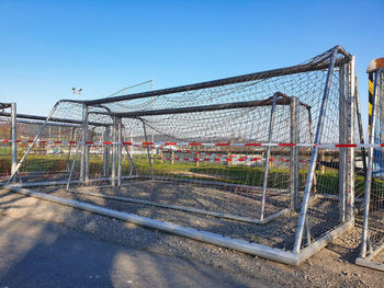 View of soccer field against clear sky