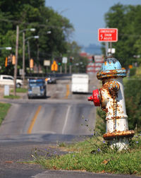 Close-up of road sign on street