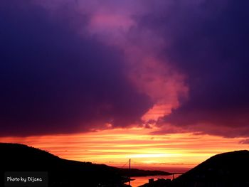 Scenic view of dramatic sky during sunset