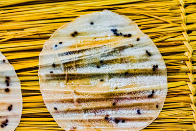 High angle view of fish on barbecue
