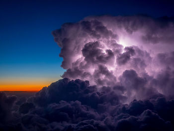 Low angle view of clouds in sky at sunset