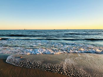 Scenic view of sea against clear sky