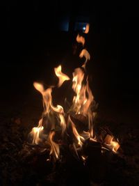 Bonfire on field at night