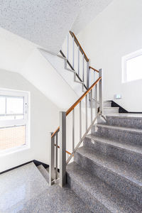 Low angle view of spiral staircase in building