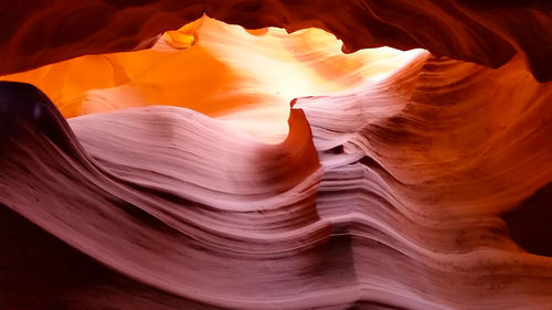 Close-up of rock formation with natural crystallized amber tones