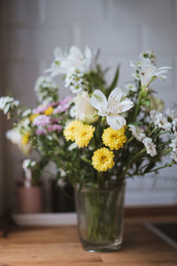 Close-up of white flower vase on table
