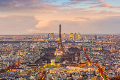 Aerial view of city buildings during sunset