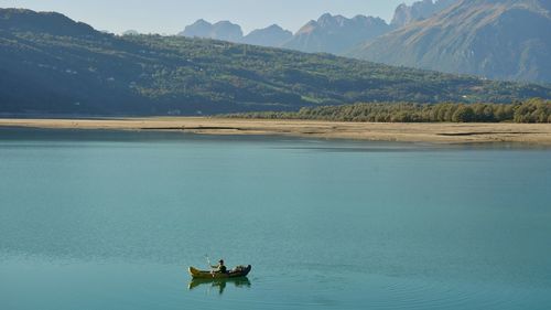 Scenic view of lake against mountain