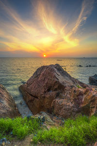 Scenic view of sea against sky during sunset