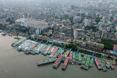 High angle view of illuminated modern buildings in city