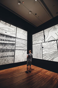 Full length of man standing in corridor