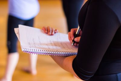 Low section of woman sitting