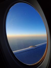 Scenic view of landscape seen through airplane window