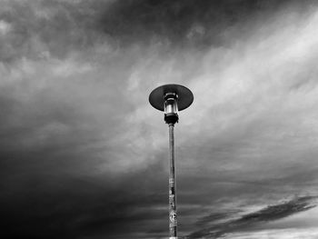 Low angle view of street light against sky