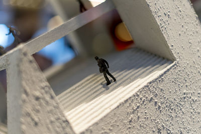 High angle view of figurine outdoors
