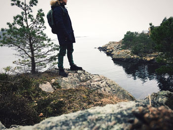 Man standing on cliff