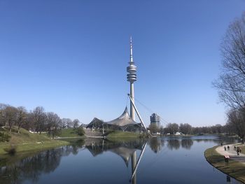 Reflection of communications tower in water