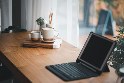 Coffee cup on table