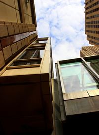 Low angle view of modern building against sky