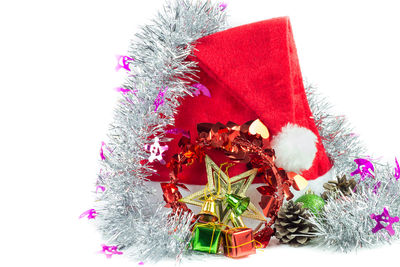 Close-up of christmas tree against white background