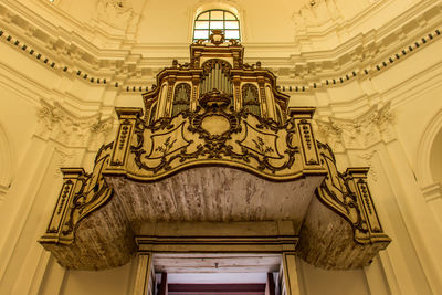 Low angle view of sculpture in building