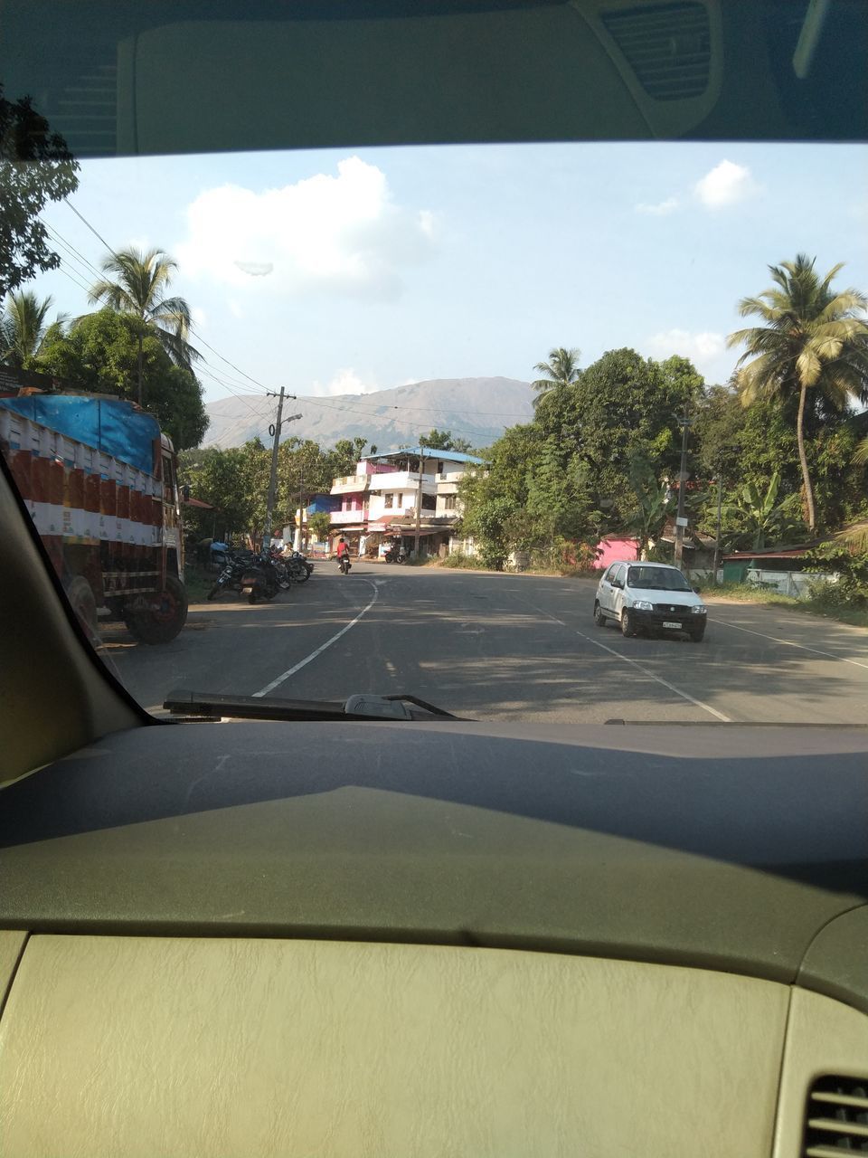 CARS ON STREET SEEN THROUGH WINDSHIELD