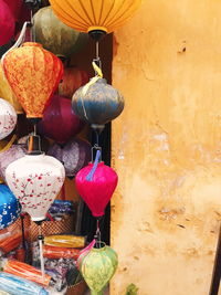 Lanterns hanging on wall for sale in market