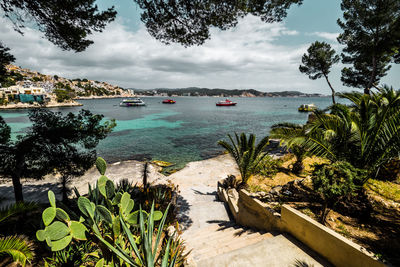 Scenic view of sea against cloudy sky