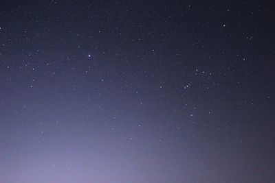 Low angle view of stars against sky at night