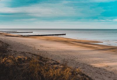 Scenic view of beach against sky
