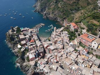 High angle view of townscape by sea