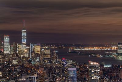 Illuminated buildings in city at night