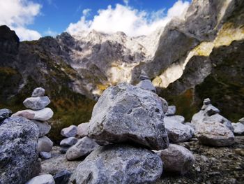 Rocks in mountains against sky