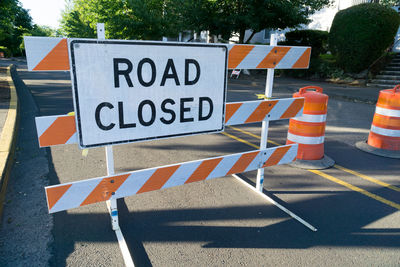 Road sign on street in city