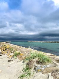 Scenic view of beach against sky