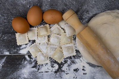 Cropped hand of person preparing food