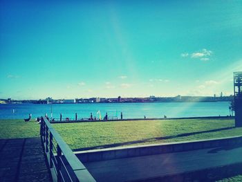 Scenic view of sea against blue sky