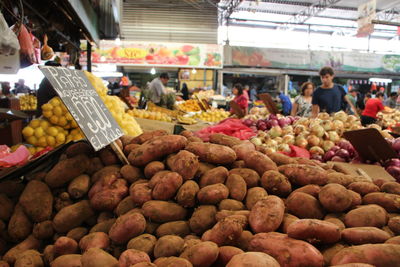 Various vegetable stalls at market